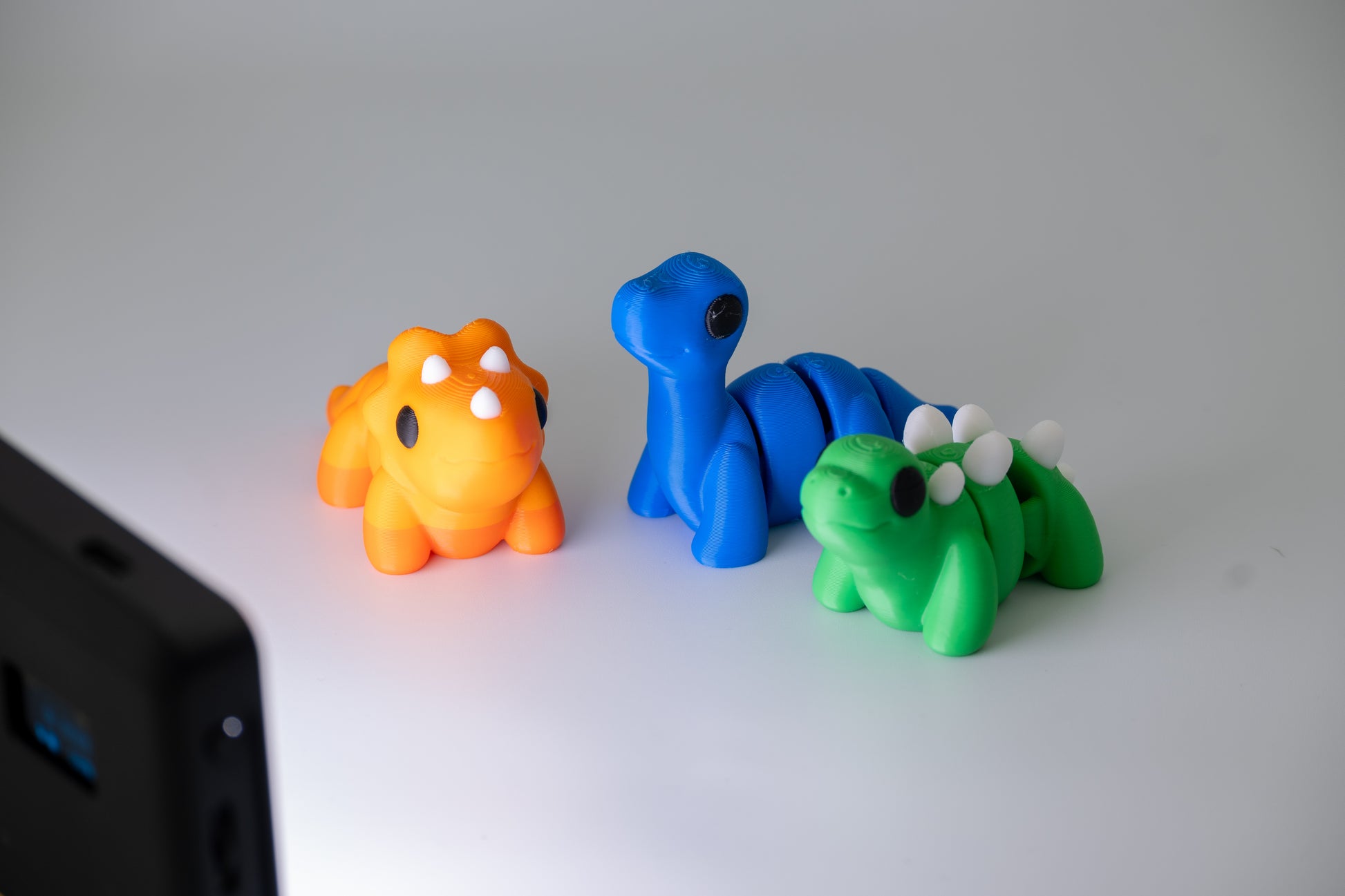 3d printed wiggling dinosaur toys. 